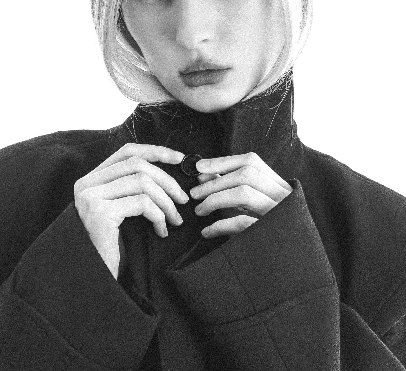 Hands fastening a collar